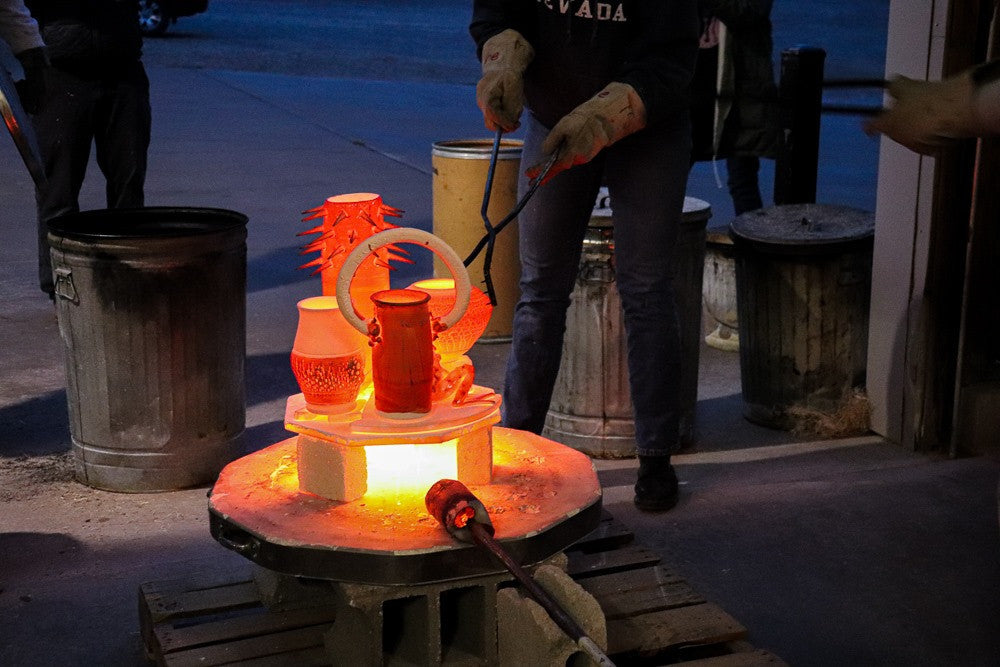 The kiln shelf glows from the heat too!

PHOTO CREDIT: Ella Spillman